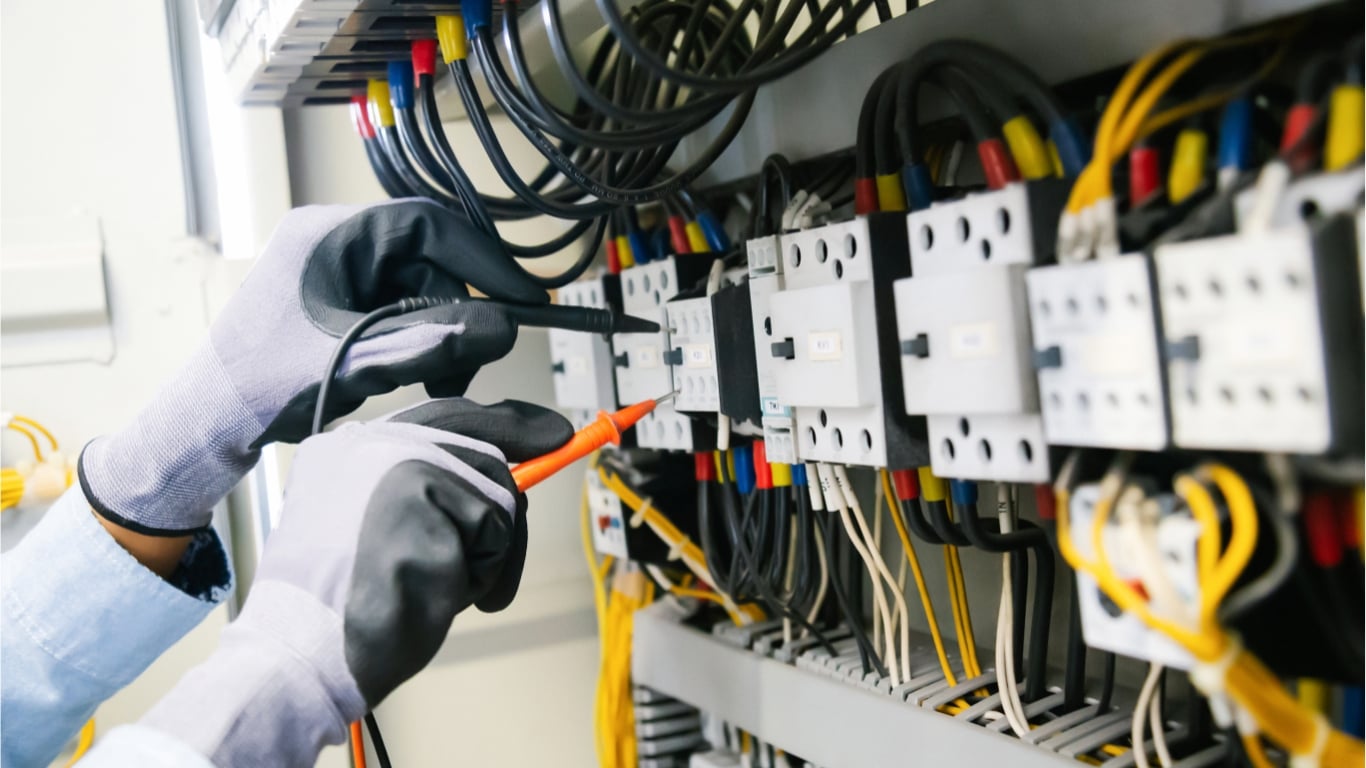 Professional electricians installing electrical systems in London - Richy Electrical Services